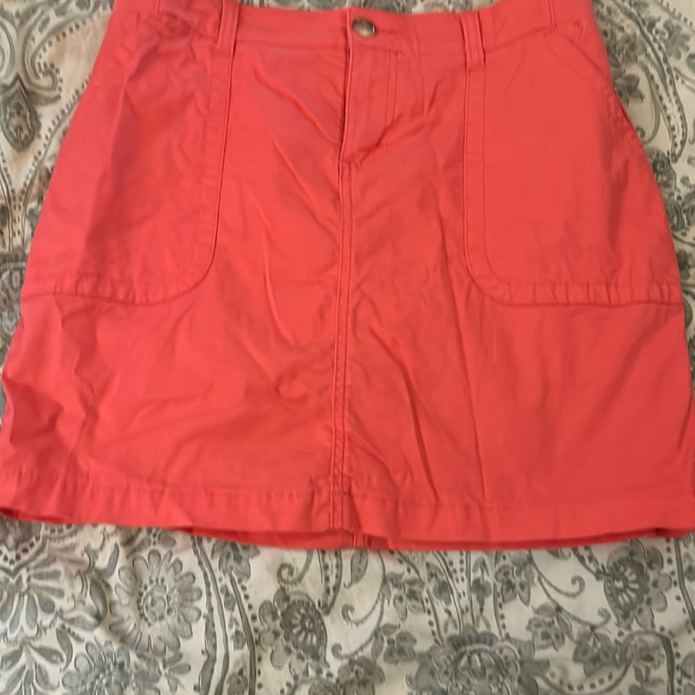 Coral colored skort. Barly worn.
